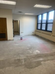 empty room with concrete flooring